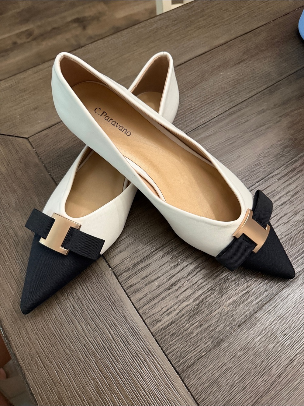 C. Paravano Two-Tone Pointed Toe Flats in Cream and Black